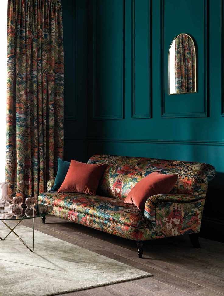 Teal living room with sofa in trebah velvet from Osborne and Little Velvet