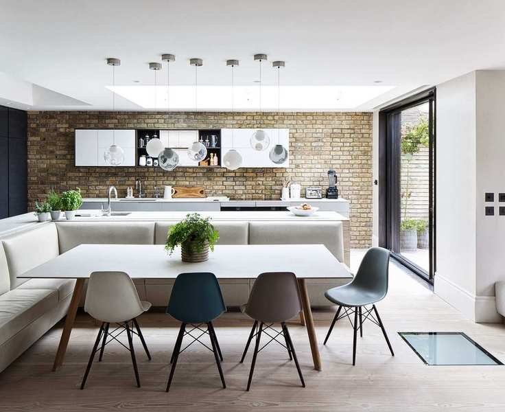 Kitchen with l-shaped seating booth