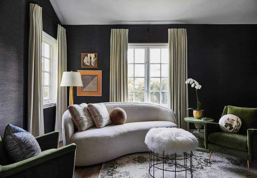living room with dark walls and modern furniture