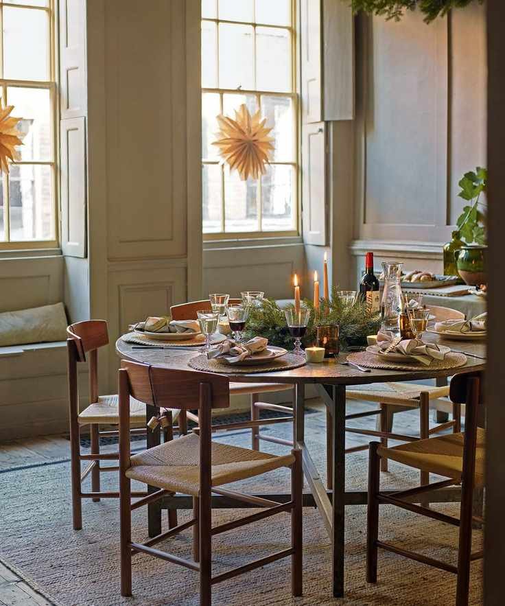Dining room featuring a round wooden table and chairs