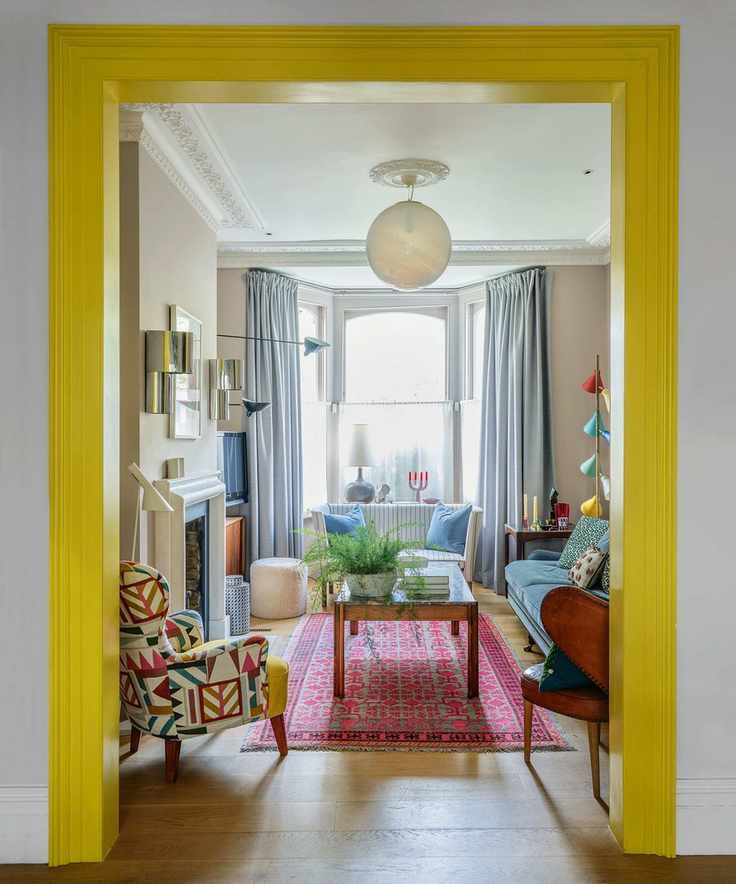 Living room accent wall with painted door frame