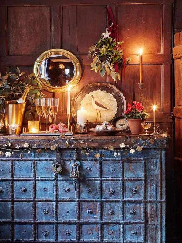 Old indian chest styled for New Year with champagne and flutes