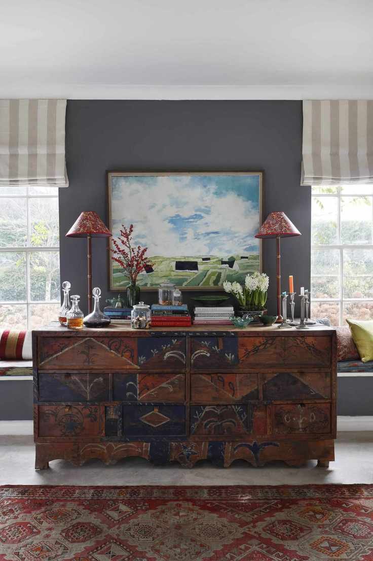 living room with gray accents and vintage rug
