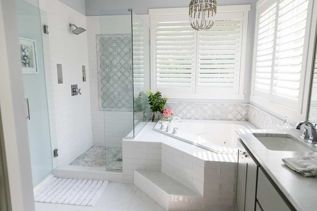 corner bath in marble bathroom