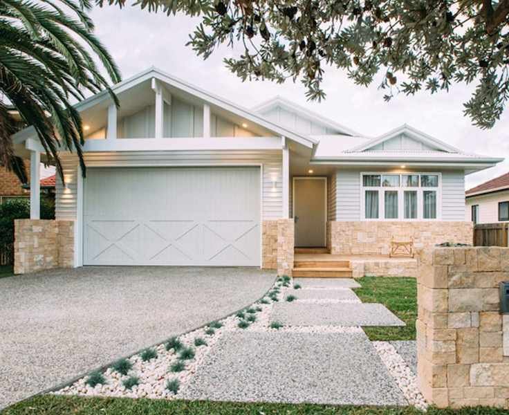 An Australian front yard with gravel panels and small succulents