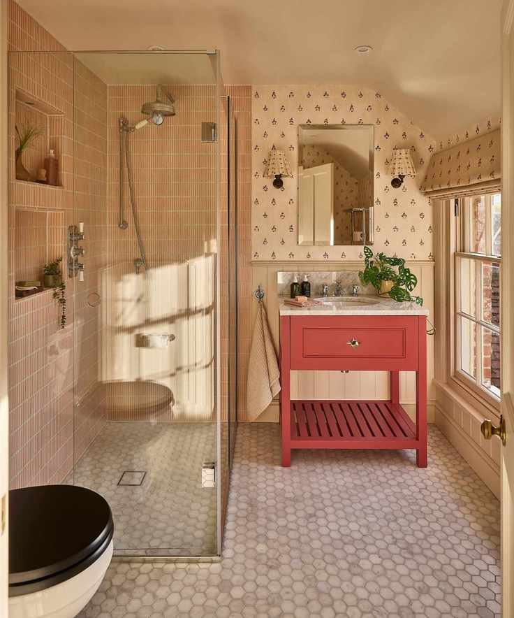 A yellow small bathroom with a walk-in shower
