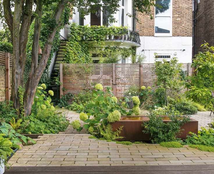 courtyard with water feature and hydrangeas
