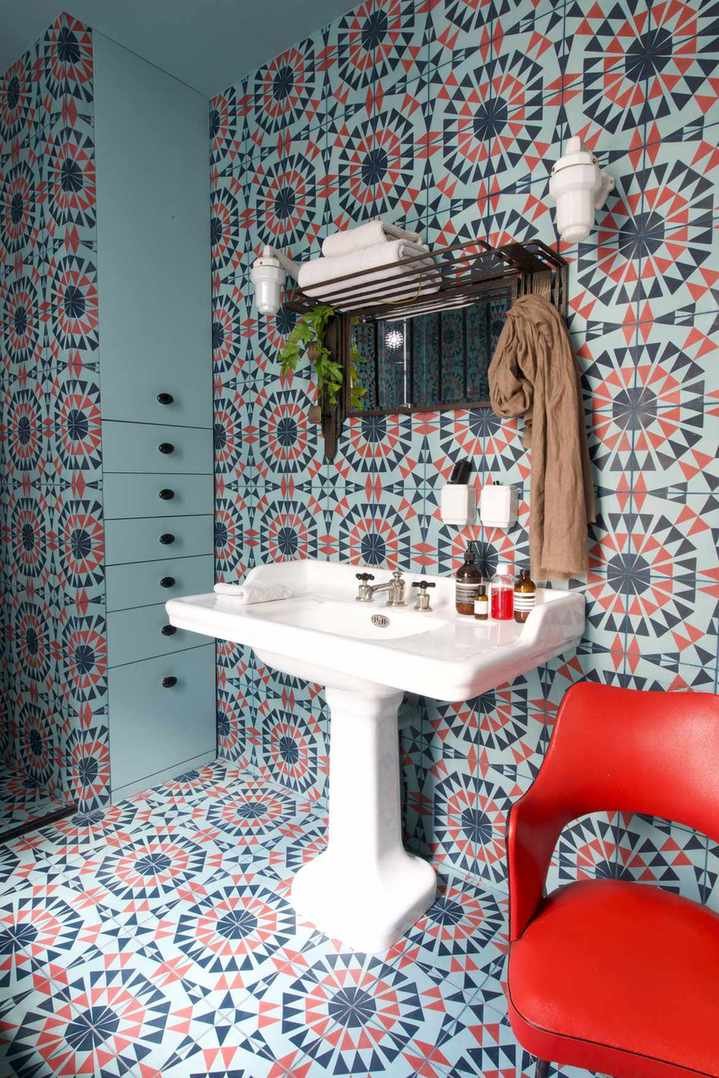 Bathroom covered in colorful kismet tiles