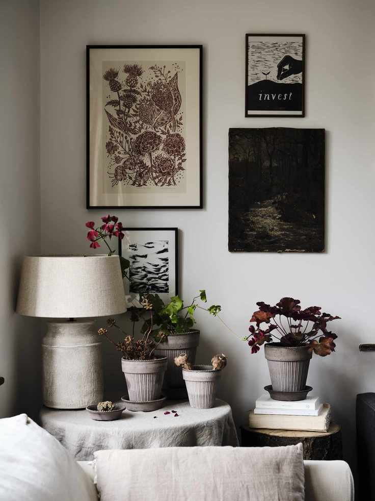 corner of living room with gallery wall and lamps