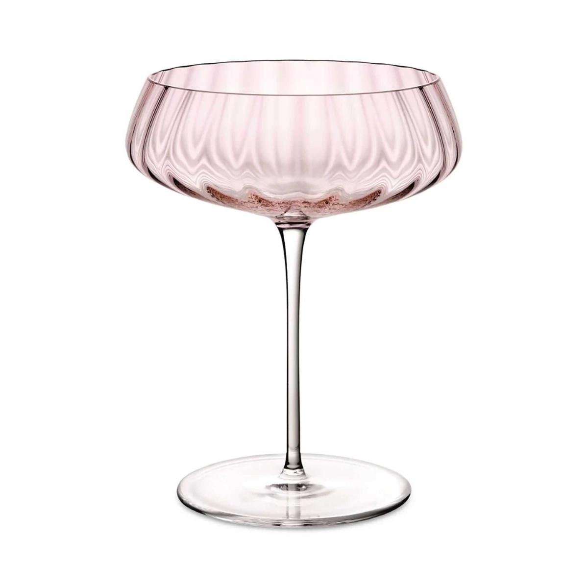 Pale pink scalloped coupe glass with a clear glass stem