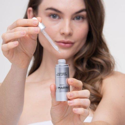 Model Holding Jan Marini Bioclear Face Lotion Model Holding Jan Marini Bioclear Face Lotion