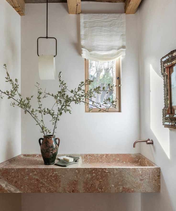 Small bathroom with pink marble sink
