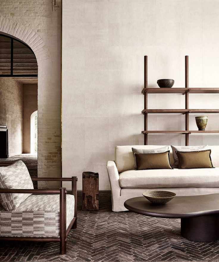 natural living room scheme with white linen sofa and shelving