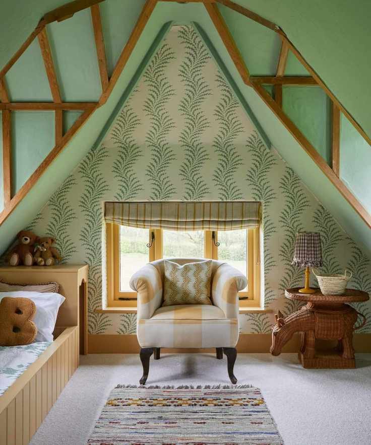 green painted and wallpapered attic kids bedroom