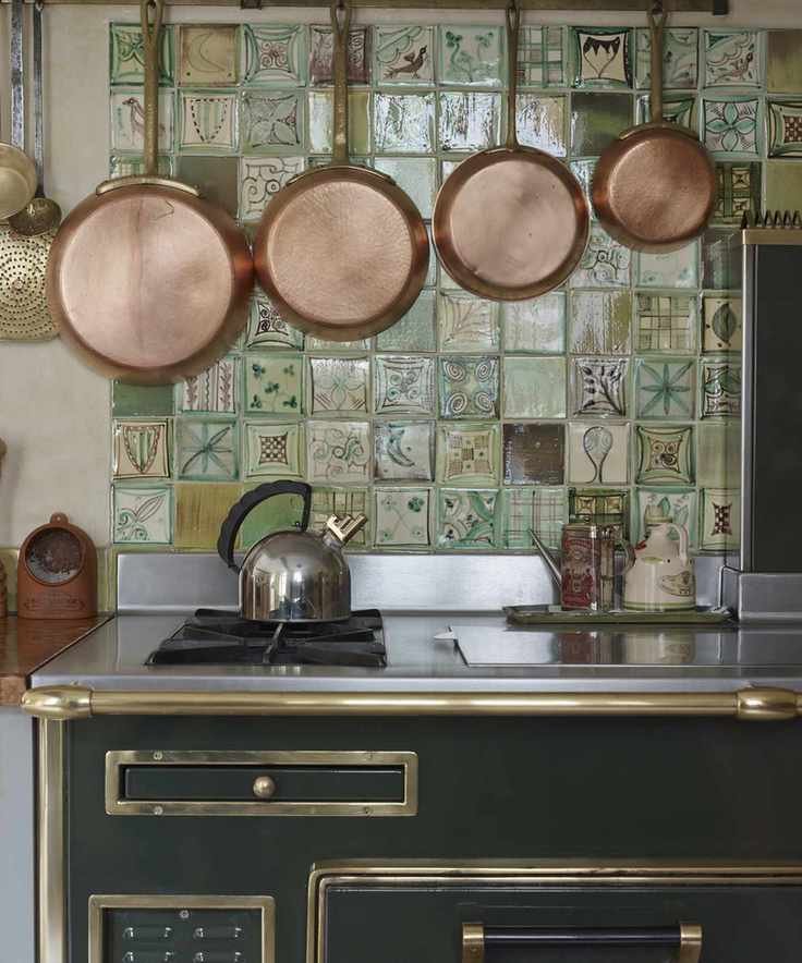 Old copper pans hanging in a kitchen