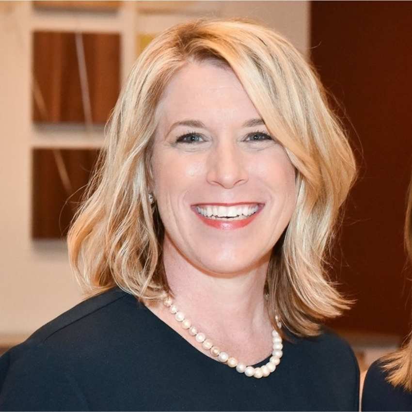 A headshot of Martha Carol-Stewart