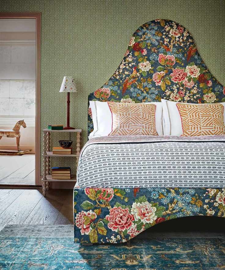 Romantic bedroom with floral headboard and bed frame