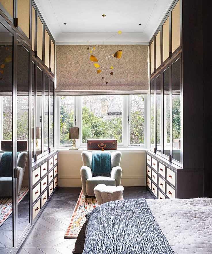 Small bedroom ideas featuring a dressing room and mirrored wardrobes