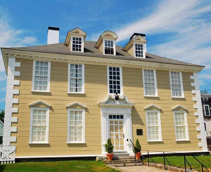 exterior of yellow and white Georgian brick house