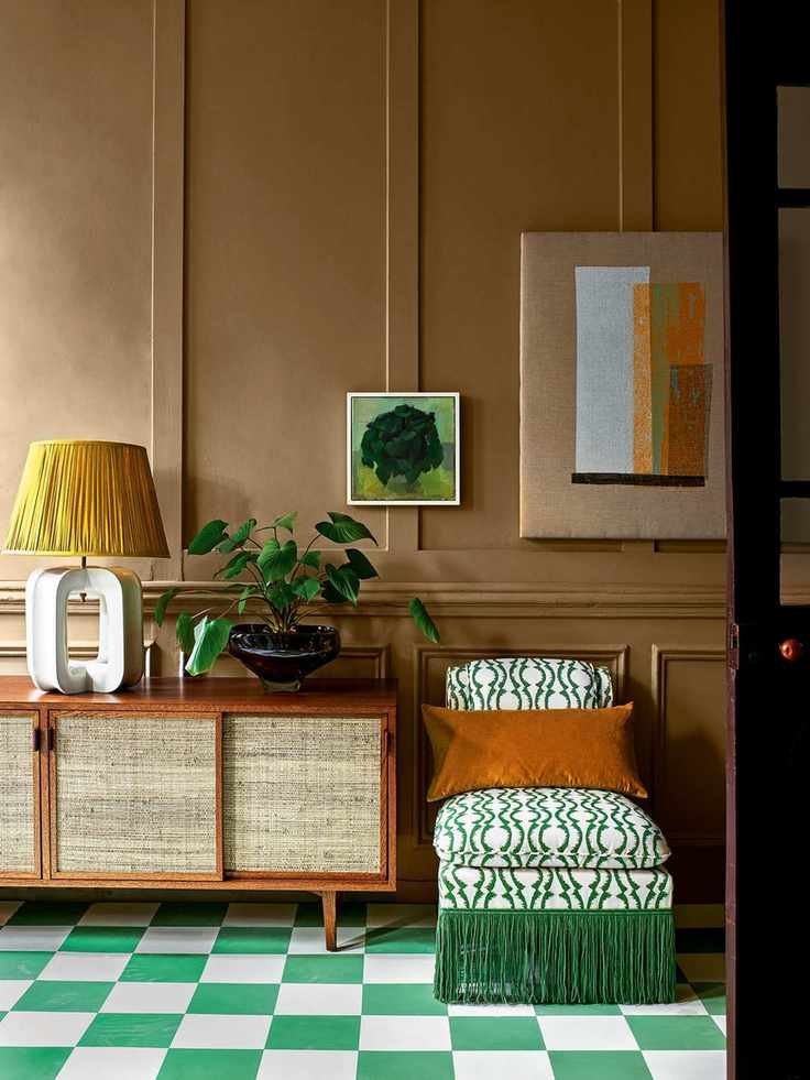 Bert & May green and white encaustic tiles in a hallway