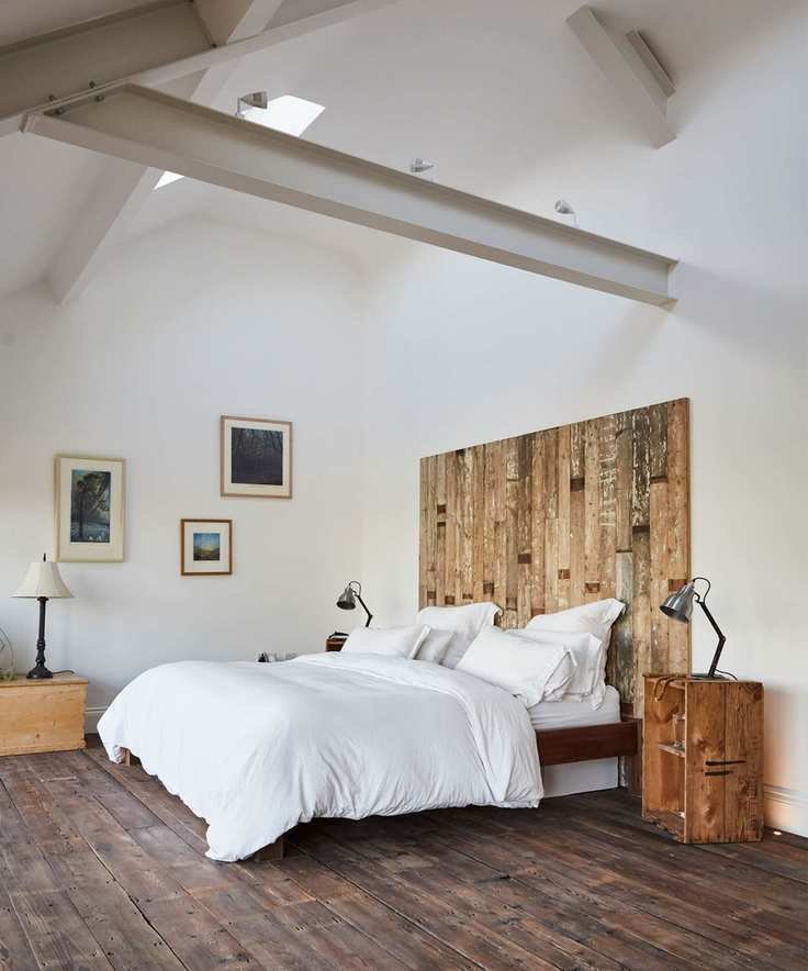 Large room in converted barn, dark wood reclaimed flooring