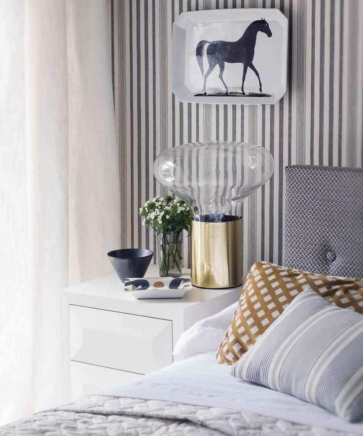 bedroom with double bed and nightstand with lamp
