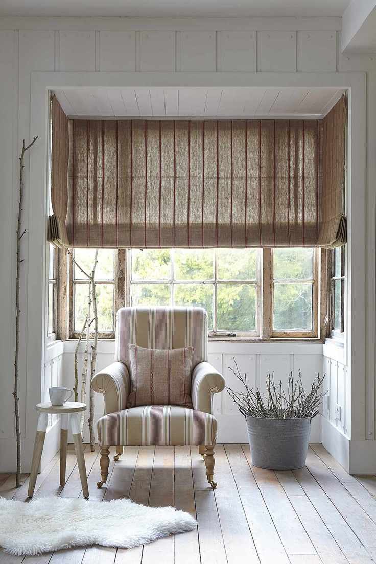 Bay window with rustic striped linen blinds