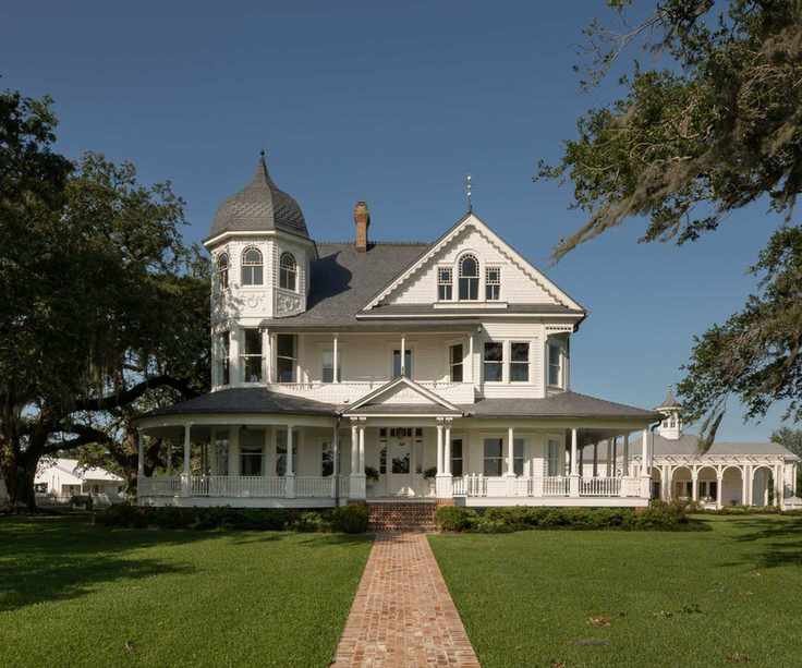 exterior of white clapboard Victorian home