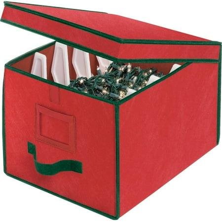 A red fabric box with a hinge lid. Inside, four white plastic dividers for wrapping tree lights around.