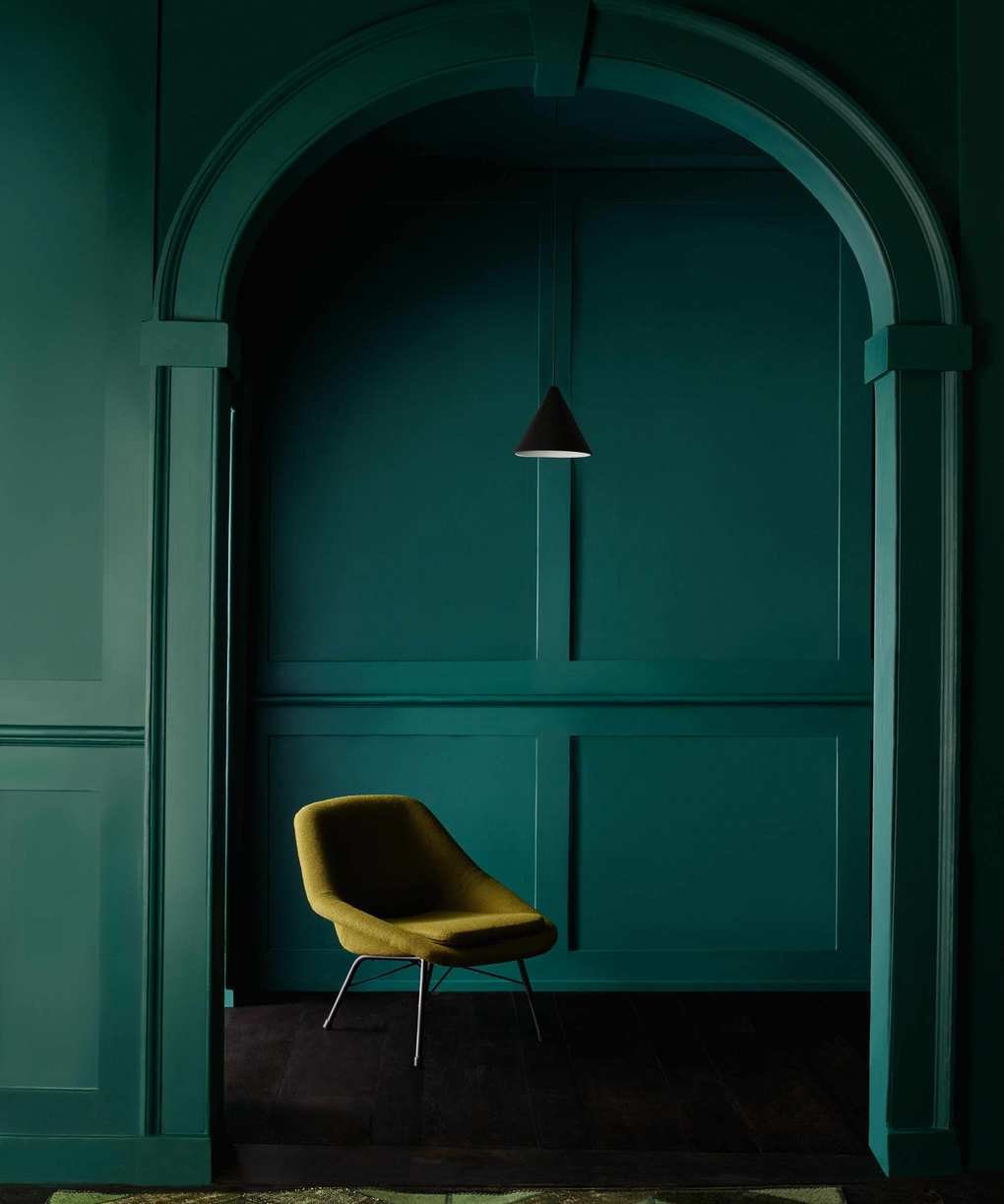 panelled room with alcove painted in dark green