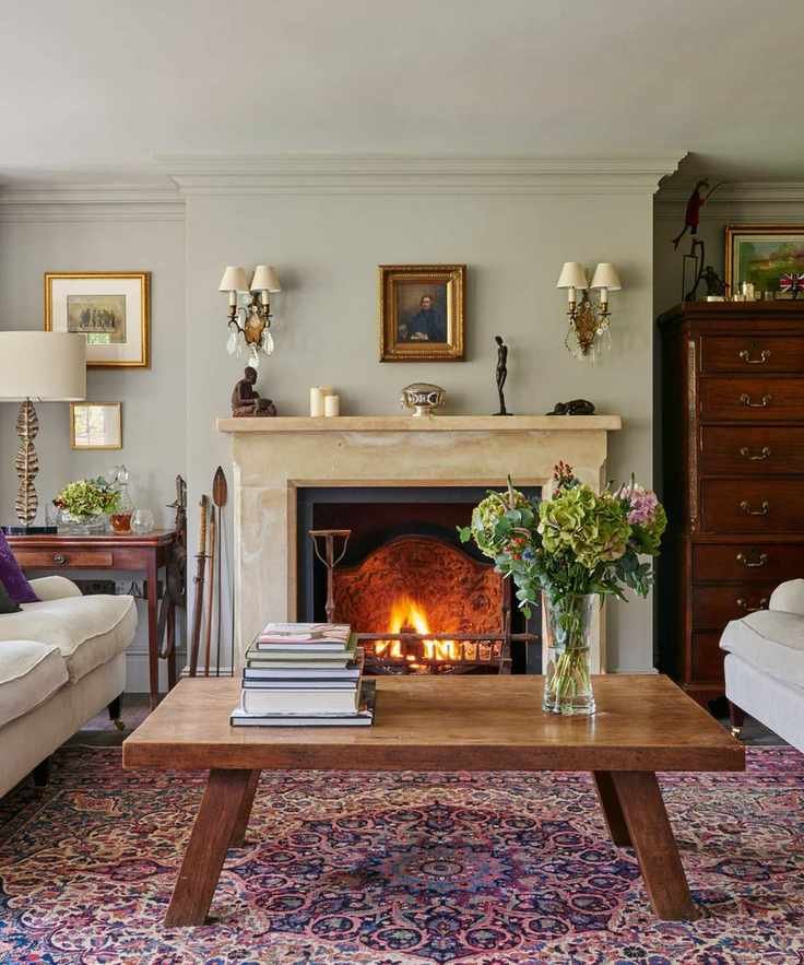 Eclectic living room with marble fireplace