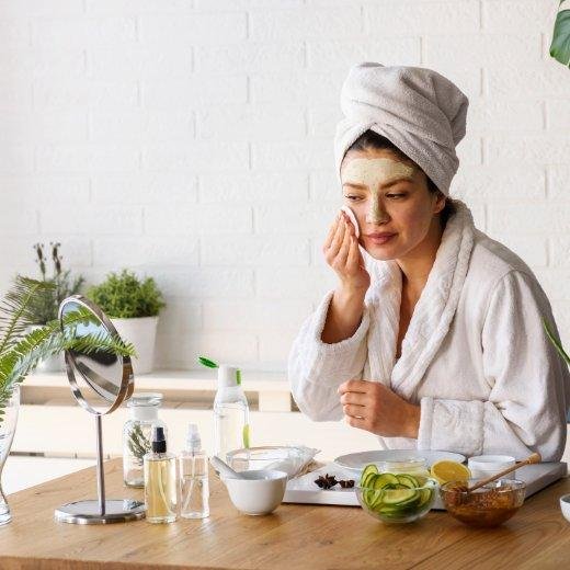 Woman cleaning her face in the morning.