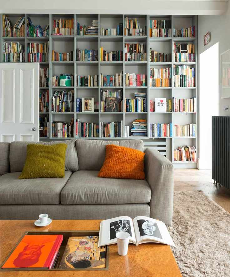 Living room with gray shelving and sofa