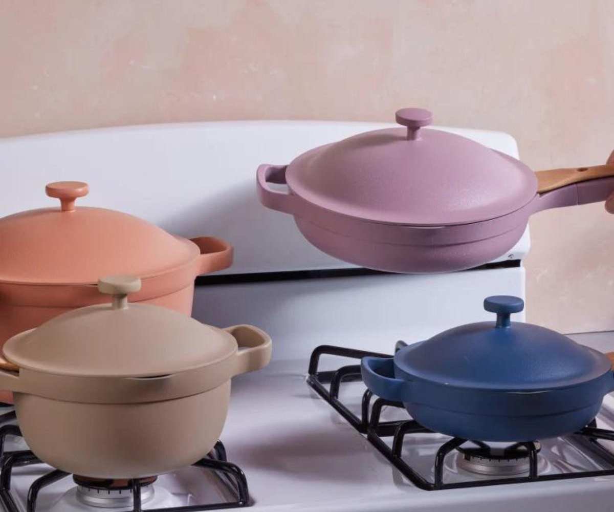 Our Place Ultimate Cookware Set on a hob.