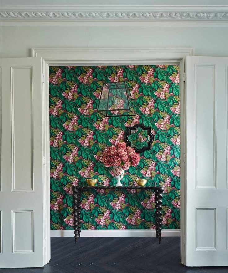 A hallway wallpaper idea with green and pink floral print