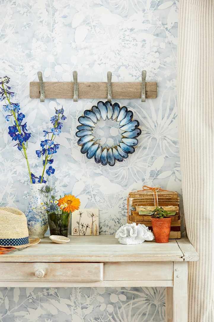 Bright blue open door in cottage hallway ideas
